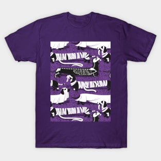 Spooktacular long dachshunds // pattern // studio purple background mummy ghost and skeleton dogs T-Shirt